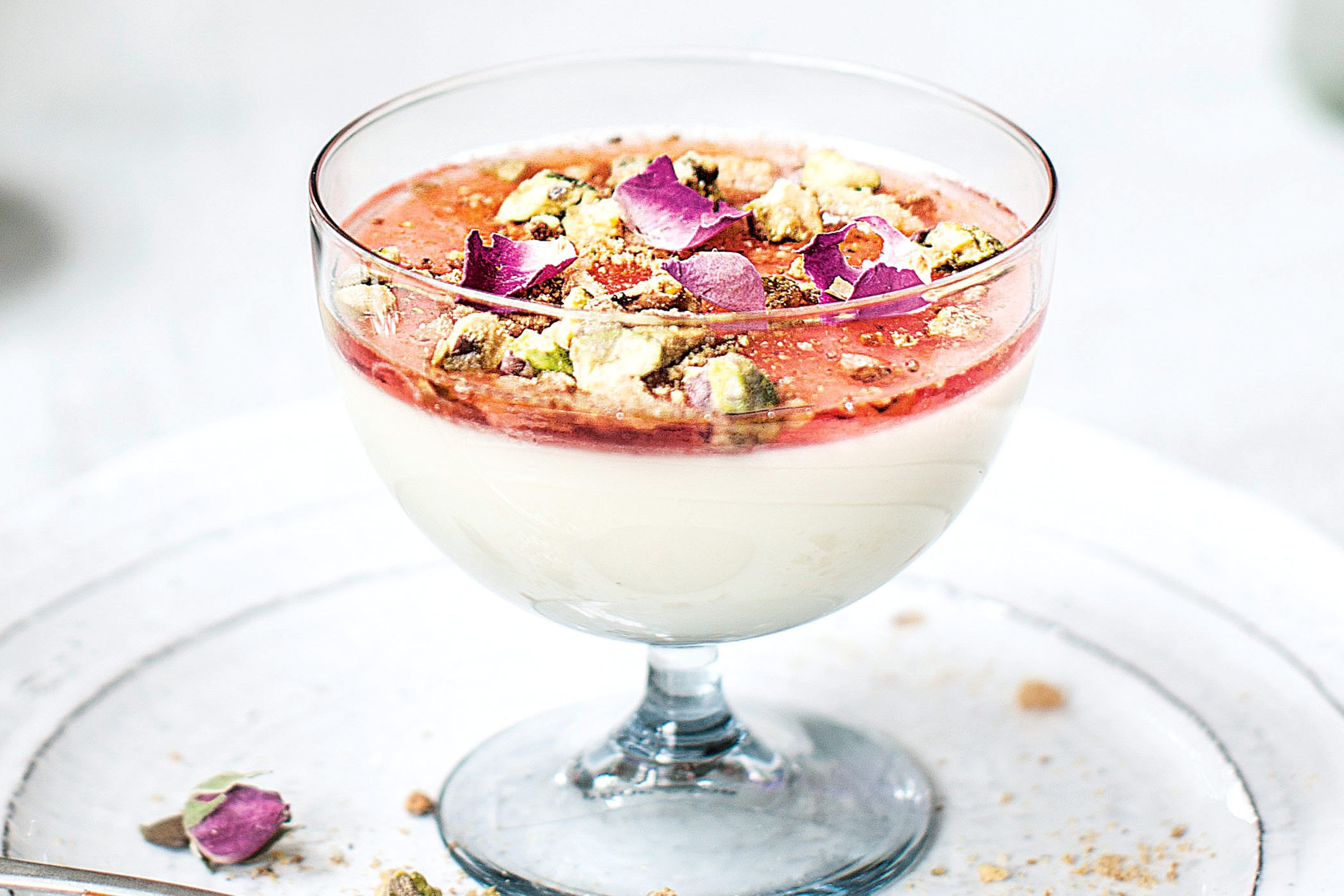 Cardamom panna cotta with rosewater syrup and pistachio praline - Recipes - delicious.com.au