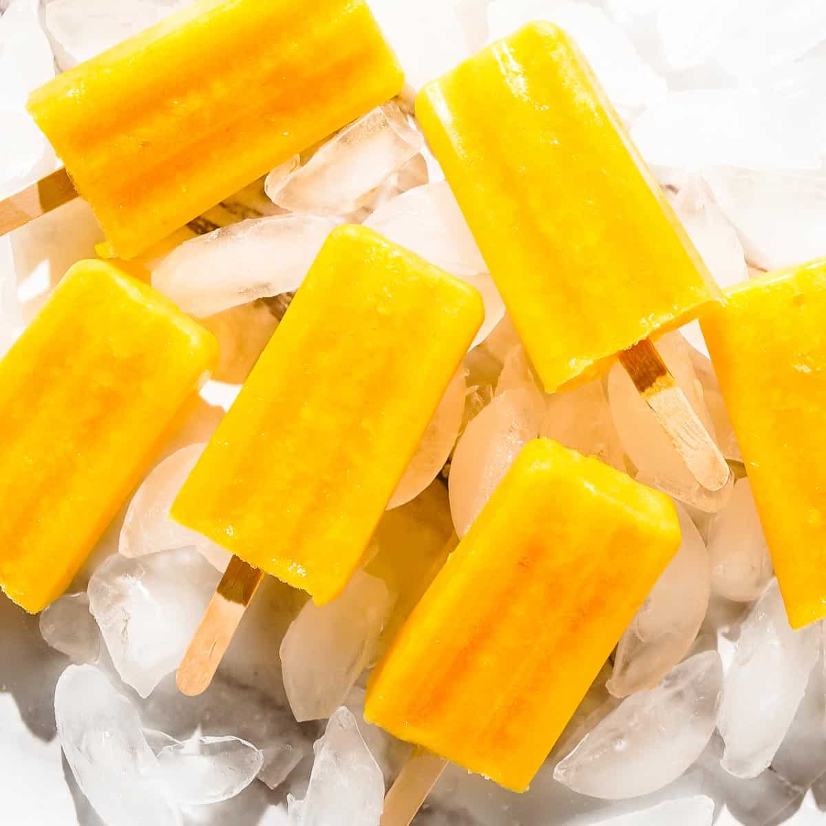 Mango Popsicles - Nibble and Dine