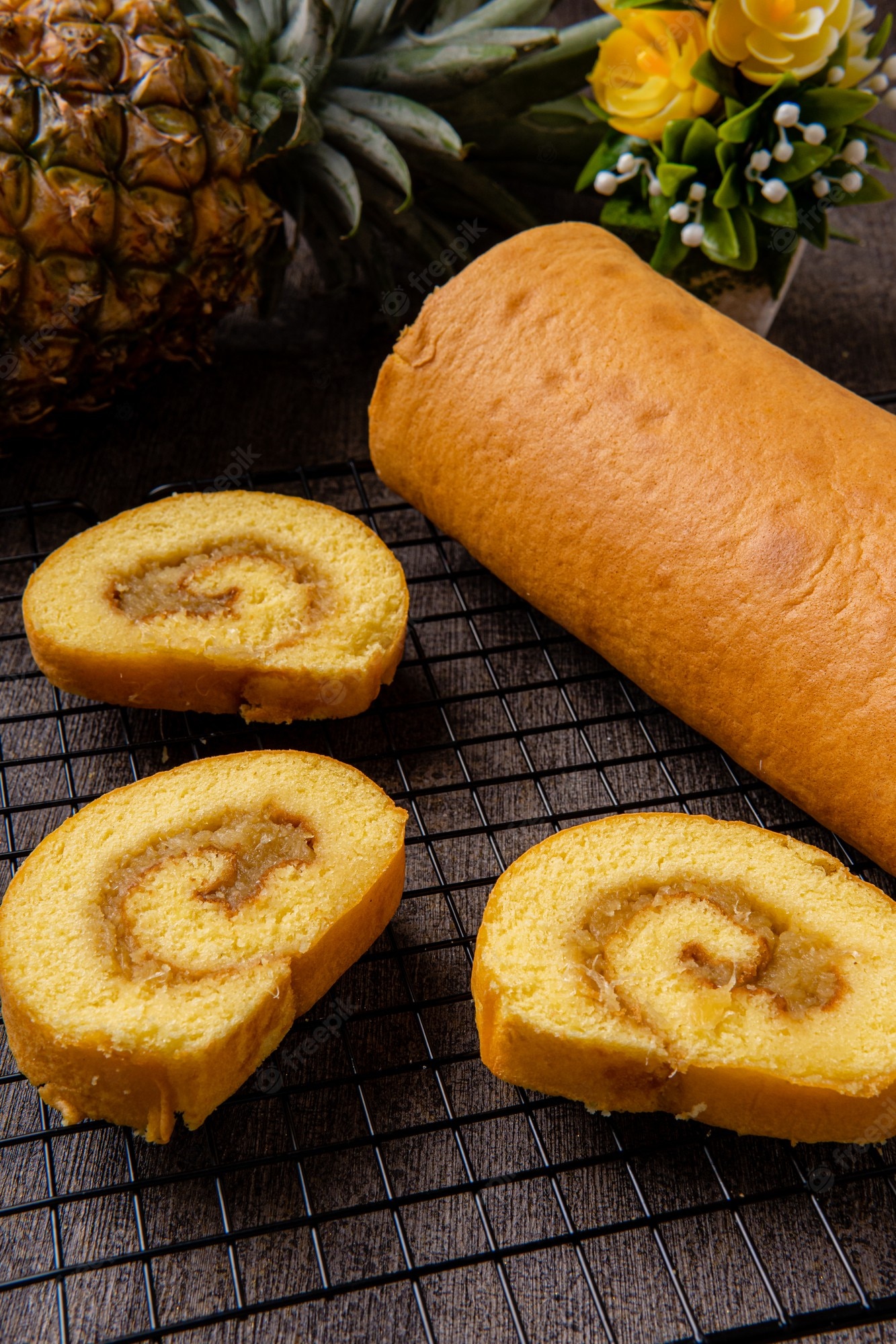Premium Photo | Delicious swiss roll roll cake or bolu gulung with  pineapple jam bolu gulung is a sponge cake that is baked using a shallow  pan filled with jam or butter